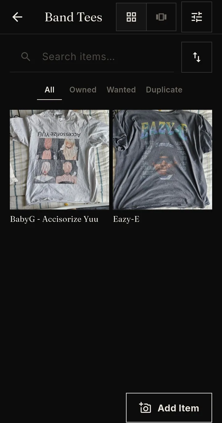 A band tee collection in tile view, editorial theme